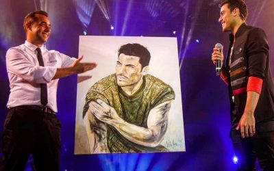 Victor Jerez firma un fin de semana entre estrellas musicales, pintando a Carlos Rivera